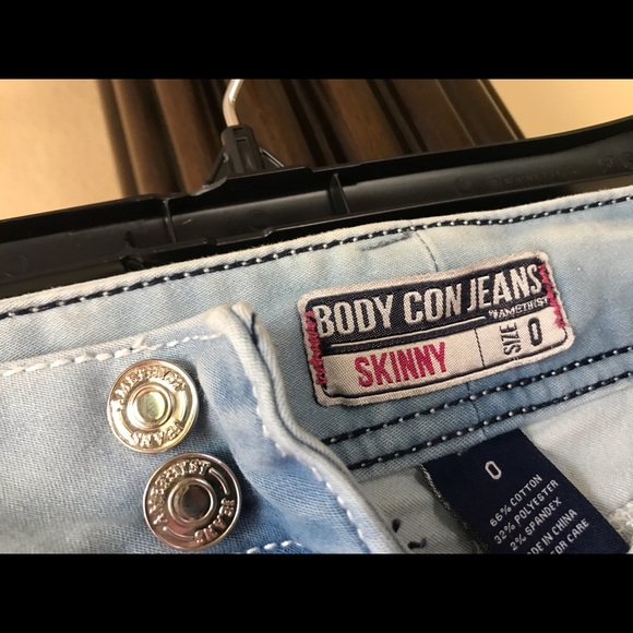 Ripped Light Blue Jeans - Picture 2 of 8